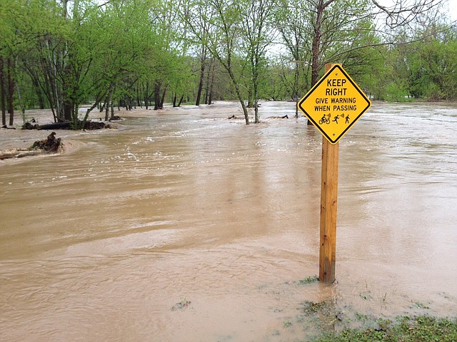 Flooding at a Lake Bella Vista trail.