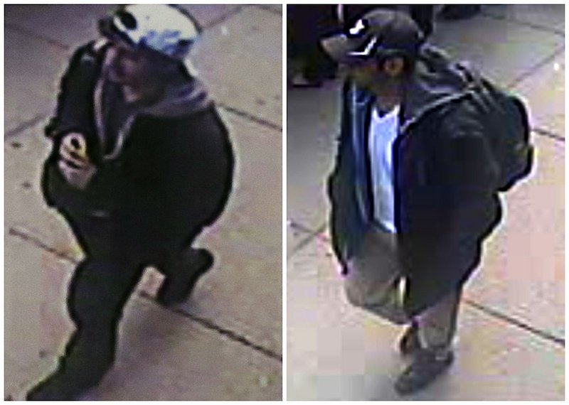 This combination of Associated Press file images released by the FBI on Thursday, April 18, 2013, show two images taken from surveillance video of what the FBI are calling suspect number 2, left, in white cap,and suspect number 1, right, in black cap, as they walk near each other through the crowd in Boston on Monday, April 15, 2013, before the explosions at the Boston Marathon.