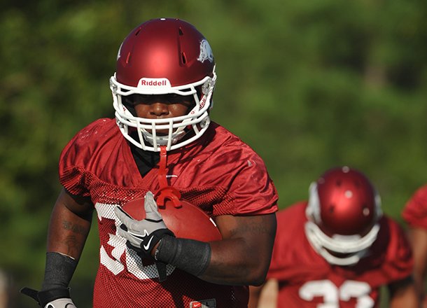 Arkansas captain Kiero Small and the rest of the Razorbacks' football team returned to the practice field Sunday after a day off.