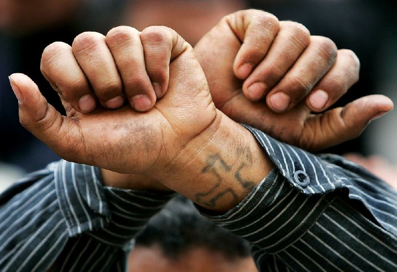 Coptic Christians, who make up about 10 percent of Egypt’s estimated 84 million people, often tattoo the image of a cross on their wrists. Many Copts have been killed in violent clashes in recent months. 