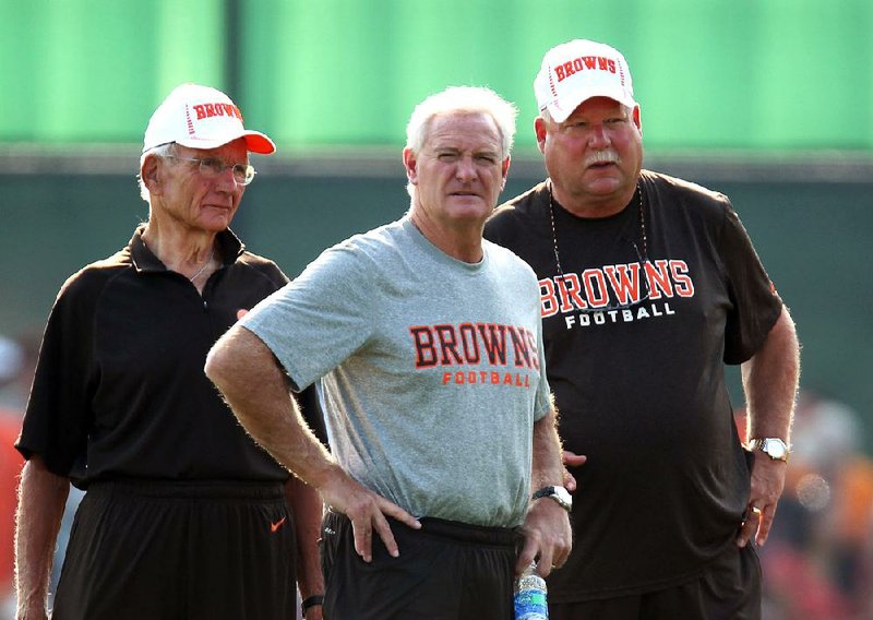 Cleveland Browns owner Jimmy Haslam (center), shown with then-team president Mike Holmgren (right) in 2012, said he will continue to run the Browns despite a federal investigation into fraud within Pilot Flying J, of which he is the president. 