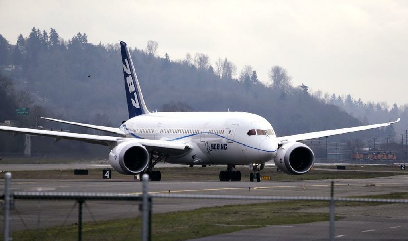 A Boeing 787 flight-test jet taxis after a flight at Boeing Field in Seattle in February. The Federal Aviation Administration on Friday approved the company’s plans to fix the plane’s batteries. 