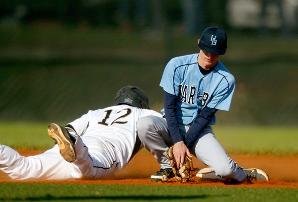 Bentonville's Will Jibas safely dives back to second base ahead of the throw to Springdale Har-Ber second baseman Zach Vogel in the bottom of the fifth inning on Friday, April 19, 2013, at Bentonville.