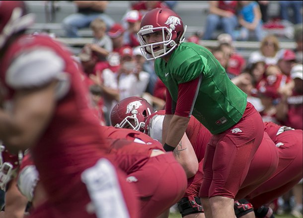 Arkansas Red Team quarterback Brandon Allen calls a play at the line of scrimmage during the first half of a spring NCAA college football game in Fayetteville, Ark., Saturday, April 20, 2013. Arkansas Red beat Arkansas White 34-27. (AP Photo/Gareth Patterson)