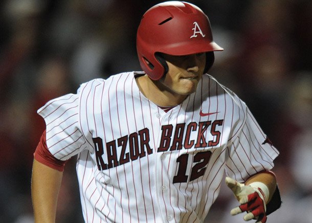 Arkansas second baseman Jordan Farris begins to round the bases after hitting a two-run home run Saturday, April 20, 2013, during the third inning of play against Texas A&M at Baum Stadium.