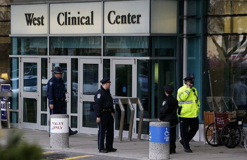 Police guard the entrance to Beth Israel Deaconess Medical Center on Saturday. Dzhokhar Tsarnaev, one of the suspected Boston Marathon terrorists, is hospitalized in serious condition at the facility. 