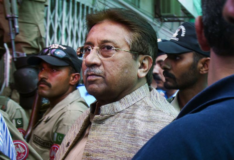 Pakistan’s former president and military ruler Pervez Musharraf arrives at an anti-terrorism court Saturday in Islamabad. 