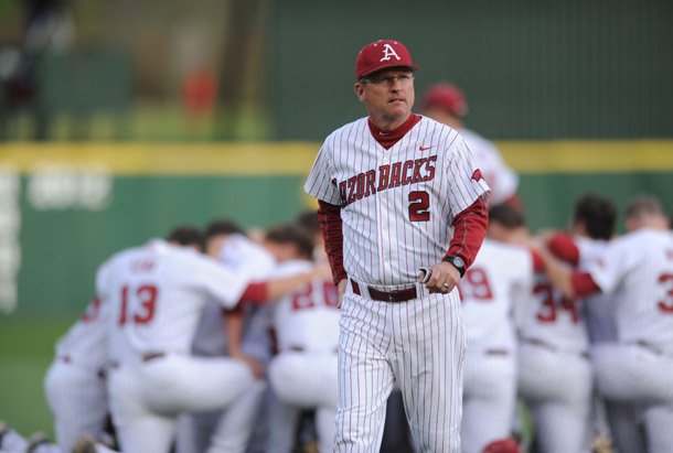 Arkansas coach Dave Van Horn walks to the dugout Saturday, April 20, 2013, before the start of play against Texas A&M at Baum Stadium in Fayetteville.