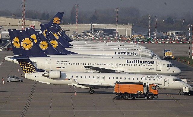 Lufthansa Airplanes are parked during a warning strike of employees of the German airliner Lufthansa in Duesseldorf, Germany, Monday, April 22, 2013.(AP Photo/Frank Augstein)