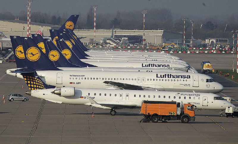 Lufthansa Airplanes are parked during a warning strike of employees of the German airliner Lufthansa in Duesseldorf, Germany, Monday, April 22, 2013.(AP Photo/Frank Augstein)