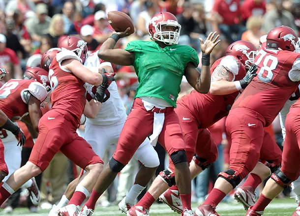  University of Arkansas quarterback Brandon Mitchell drops back to pass during Saturdays Red White Scrimmage at Razorback Stadium in Fayetteville.