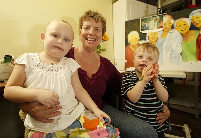 Susan Hutchcroft, co-founder of the Community Creative Center at Nadine Baum Studios, the studio in her Springdale home, which doubles as her grandchildren's playroom. 