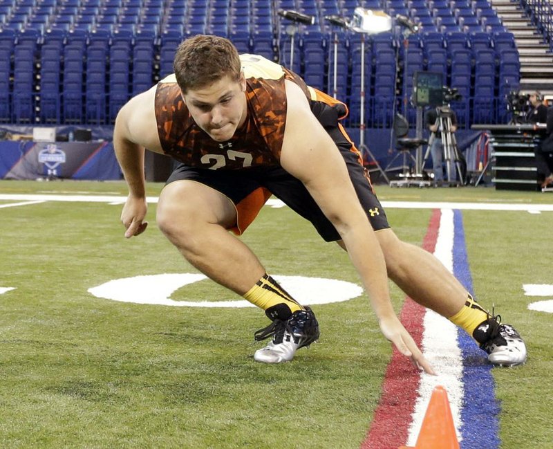Former Texas A&M offensive tackle Luke Joeckel, shown during a drill at the NFL Scouting Combine in February, could be the first overall pick of the NFL Draft tonight. An offensive tackle has been chosen No. 1 only twice since the NFL/AFL merger in 1970. 
