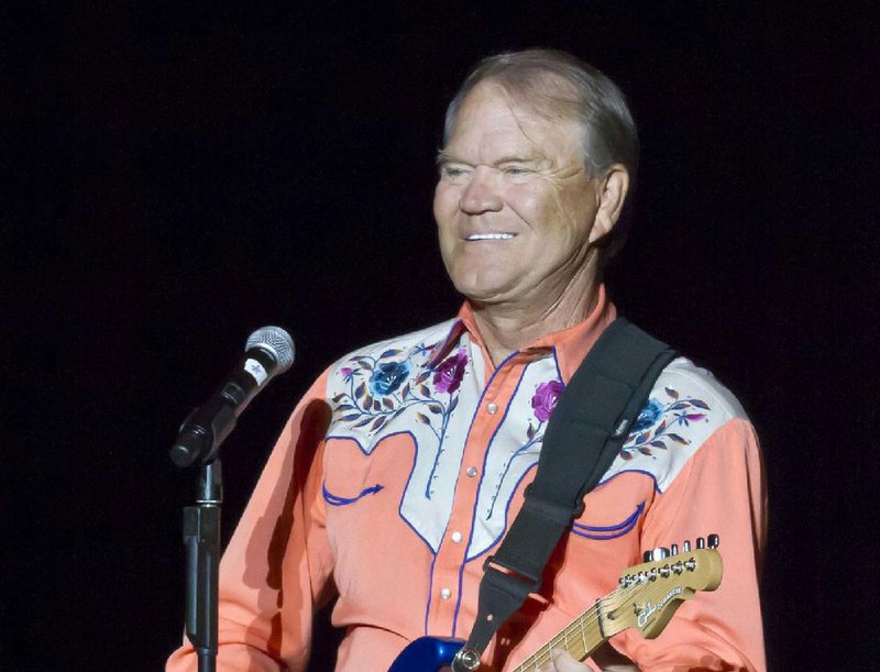 Glen Campbell performed in North Little Rock’s Verizon Arena in September during his Goodbye Tour, but he sat silently in front of lawmakers Wednesday in Washington, D.C., as his daughter spoke for him, urging more Alzheimer’s research. 