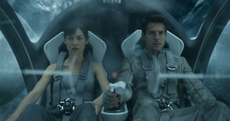 Olga Kurylenko and Tom Cruise star in Oblivion. The film came in first at last weekend’s box office and made more than $37 million. 
