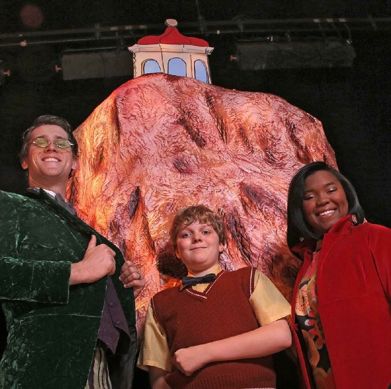 Just peachy: Garrett Flood (left) plays Old Green Grasshopper, Jeffrey Oakley plays James and Jhonika Wright plays Ladybird in James and the Giant Peach at the Arkansas Arts Center Children’s Theatre. 