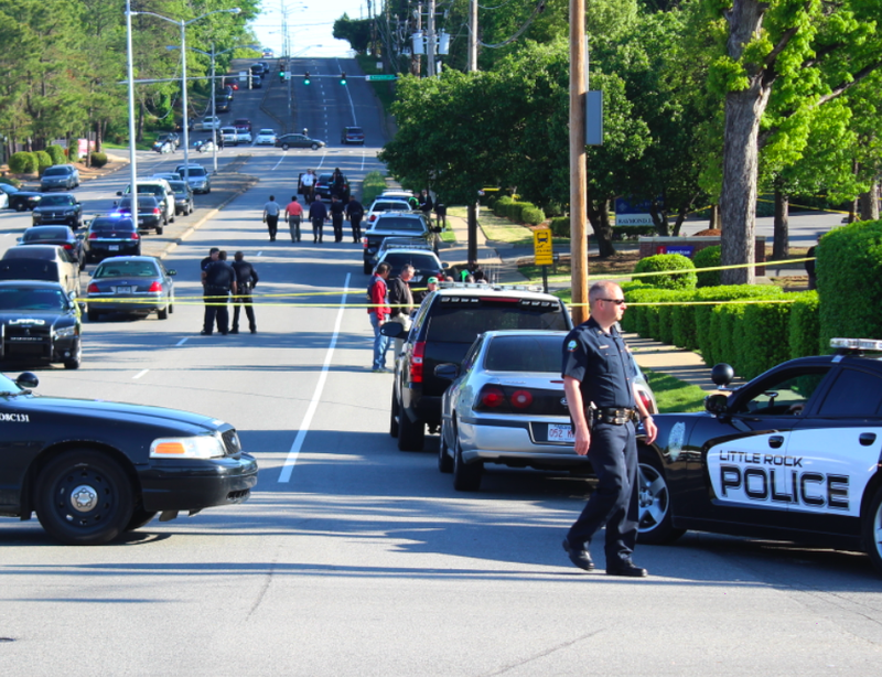 Police block University Avenue at H Street Thursday after a chase resulted in a suspect being shot by police in the area.