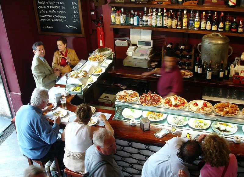 Tempting plates in Spain’s tapas bars make it easy to sample new foods.