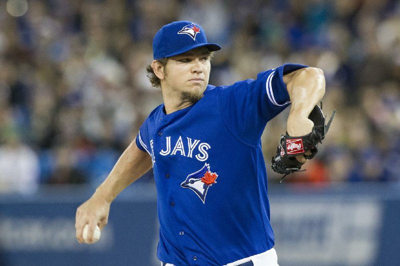 Toronto Blue Jays pitcher Josh Johnson was scratched from Friday’s start against the New York Yankees because of right triceps tightness. The team hopes the precautionary move prevents Johnson from missing any other outings. 