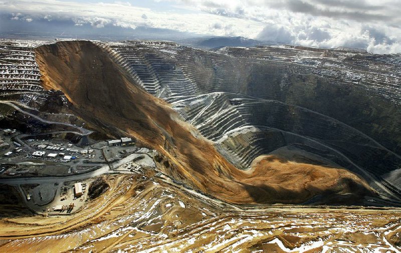 A landslide at the Bingham Canyon Mine near Salt Lake City on April 10 filled the nearly mile-deep pit with about 300 feet of rubble and forced Kennecott Utah Copper to ask 2,100 workers to take vacation or unpaid leave. 