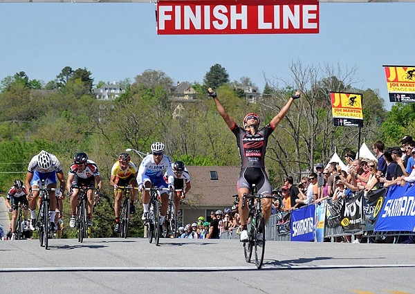 Juan Jose Haedo celebrates as he crosses the finish line in front of the pack during the men’s pro Criterium on Sunday afternoon at the Joe Martin Stage race in Fayetteville. More than 700 athletes from 20 countries and all 50 states competed in this year’s races. 