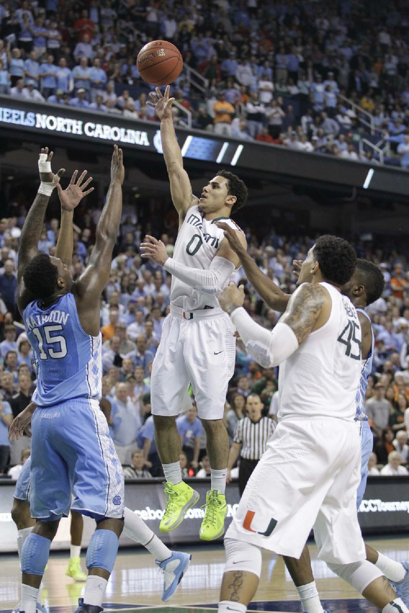 Miami guard Shane Larkin (0) declared for the NBA draft Sunday. Larkin averaged 14.5 points and 4.6 assists in 2012-2013 for the Hurricanes, who won 29 games, climbed as high as No. 2 in The Associated Press Top 25 and reached the round of 16 in the NCAA Tournament. 