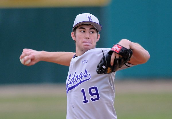 Andy Pagnozzi of Fayetteville pitches against Springdale Har-Ber on April 1 at Bulldog Stadium in Fayetteville. 