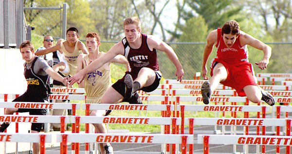 Gentry junior Jerod Cousins leads his heat in the 110 meter hurdles at the district track meet held in Gravette on Thursday.