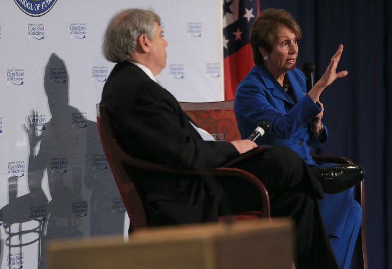 U.S. House Democratic leader Nancy Pelosi of California speaks Thursday during an appearance for the University of Arkansas Clinton School of Public Service held at the Robinson Center in Little Rock. Skip Rutherford, the school’s dean, was the master of ceremonies. 