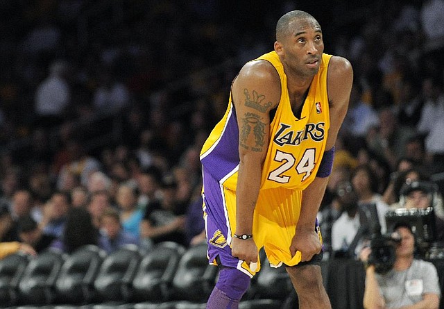Los Angeles Lakers guard Kobe Bryant is in a court battle with his mother to stop her from auctioning off keepsakes from his high school days in Pennsylvania and his early years with the Lakers. Pamela Bryant said Kobe told her five years ago that he no longer wanted the items. 
