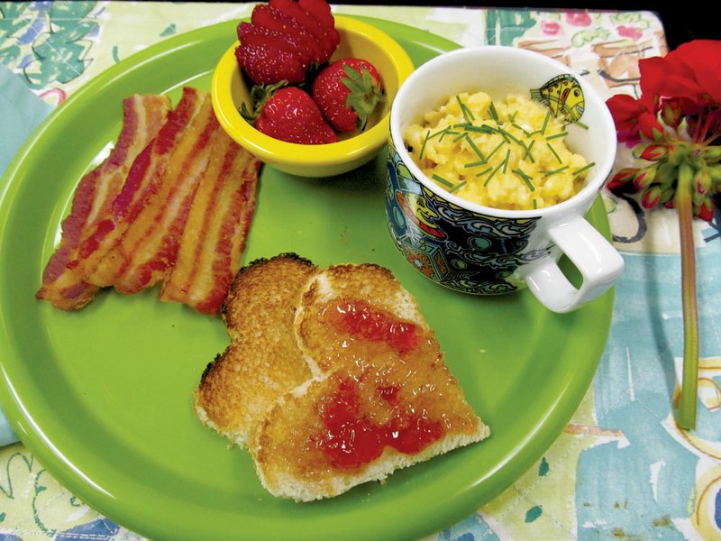 An Easy Teacup Omelet, microwave bacon and fresh fruit make Mother’s Day breakfast in bed kid-friendly and keep the kitchen safe. In-season Arkansas strawberries can be served fresh or dipped in chocolate for an extra-special treat.