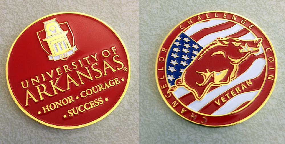 Wednesday, May 08, 2013
Chancellor's Challenge Coin
FAYETTEVILLE, Ark.  For U.S. military veterans the transition from service member to student presents many challenges and obstacles. This year the University of Arkansas will honor its graduating student veterans with a Challenge Coin Ceremony as part of the annual Graduating Student Leaders