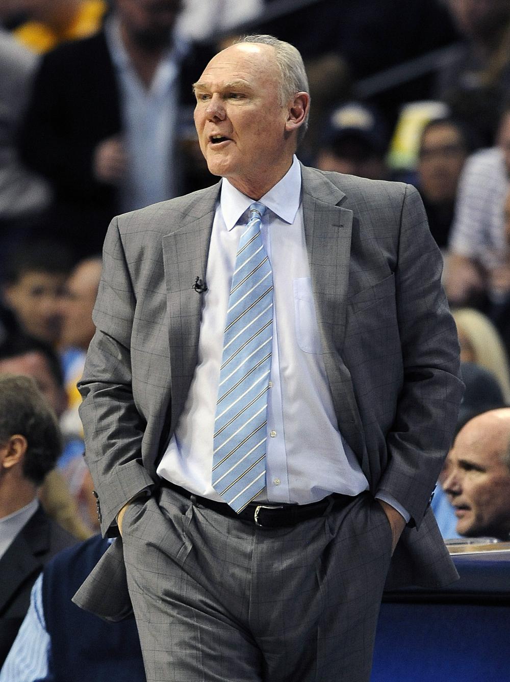 Denver Nuggets head coach George Karl looks on in the second quarter of Game 1 in the first round of the NBA basketball playoffs against the Golden State Warriors, Saturday, April 20, 2013, in Denver. The Nuggets won 97-95. (AP Photo/Chris Schneider)