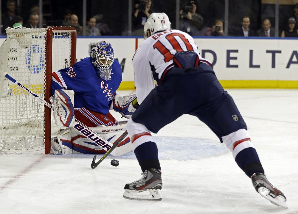 Washington Capitals left wing Martin Erat (10), of the Czech Republic, takes a shot on New York Rangers goalie Henrik Lundqvist (30), of Sweden, in the first period of Game 4 of their first-round NHL hockey Stanley Cup playoff series in New York, Wednesday, May 8, 2013. (AP Photo/Kathy Willens)