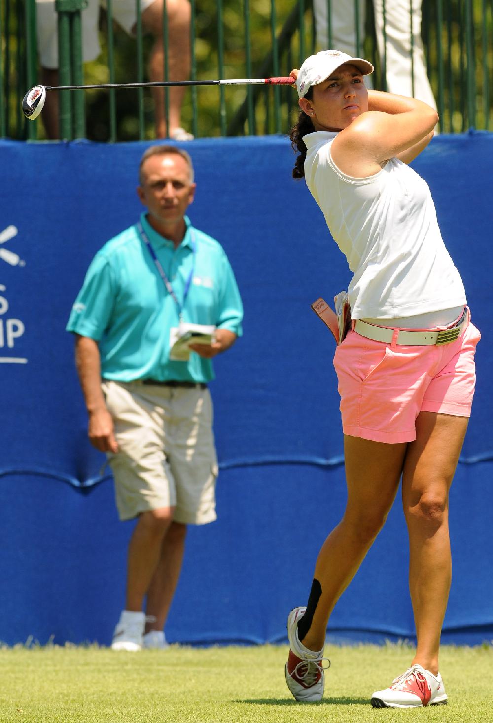 STAFF PHOTO SAMANTHA BAKER
Emily Tubert tees off hole one Friday, June 29, 2012 at Pinnacle Country Club in Rogers during day one of regular play for the Walmart NW Arkansas Championship.