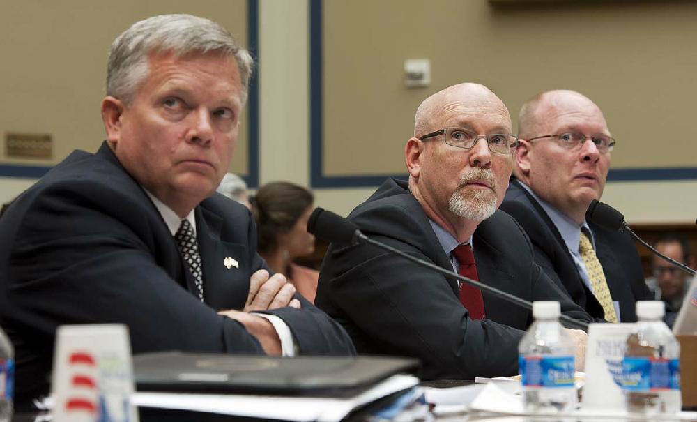 Mark Thompson, Acting Deputy Assistant Secretary for Counterterrorism, left, Gregory Hicks, former Deputy Chief of Mission in Libya, center, and Eric Nordstrom, Diplomatic Security Officer and former Regional Security Officer in Libya, right, testify before the House Oversight and Government Reform Committee's hearing on Benghazi: Exposing Failure and Recognizing Courage on Capitol Hill in Washington, Wednesday, May 8, 2013. (AP Photo/Cliff Owen)