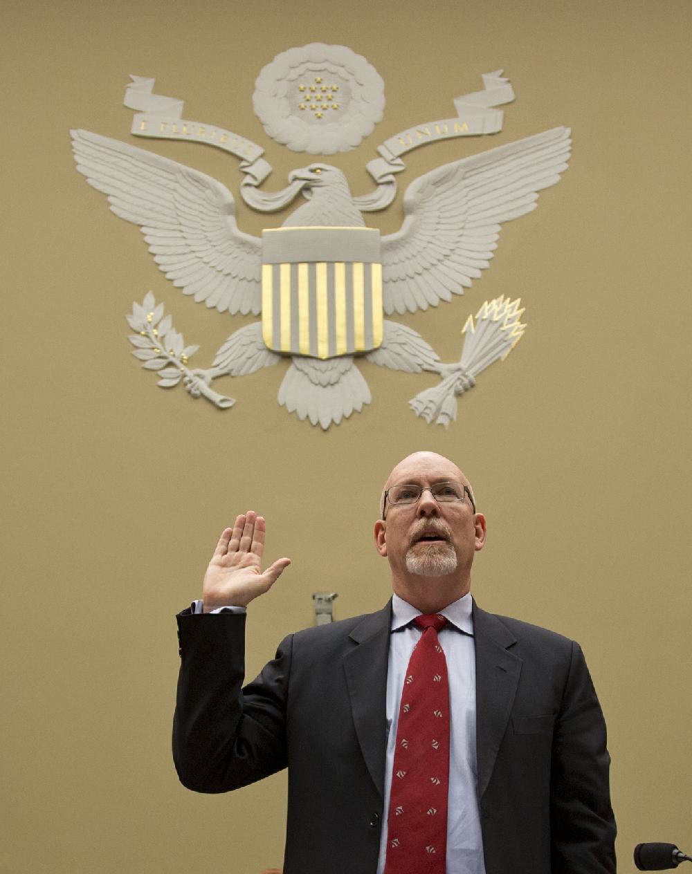 The House Oversight and Government Reform Committee holds a hearing about last year's deadly assault on the U.S. diplomatic mission in Benghazi, Libya, on Capitol Hill in Washington, Wednesday, May 8, 2013. Witness Gregory Hicks, former deputy chief of mission in Libya, is sworn in. House Republicans insist the Obama administration is covering up information about the attack, rejecting administration assurances to the contrary and stoking a controversy with implications for the 2016 presidential race. (AP Photo/J. Scott Applewhite)