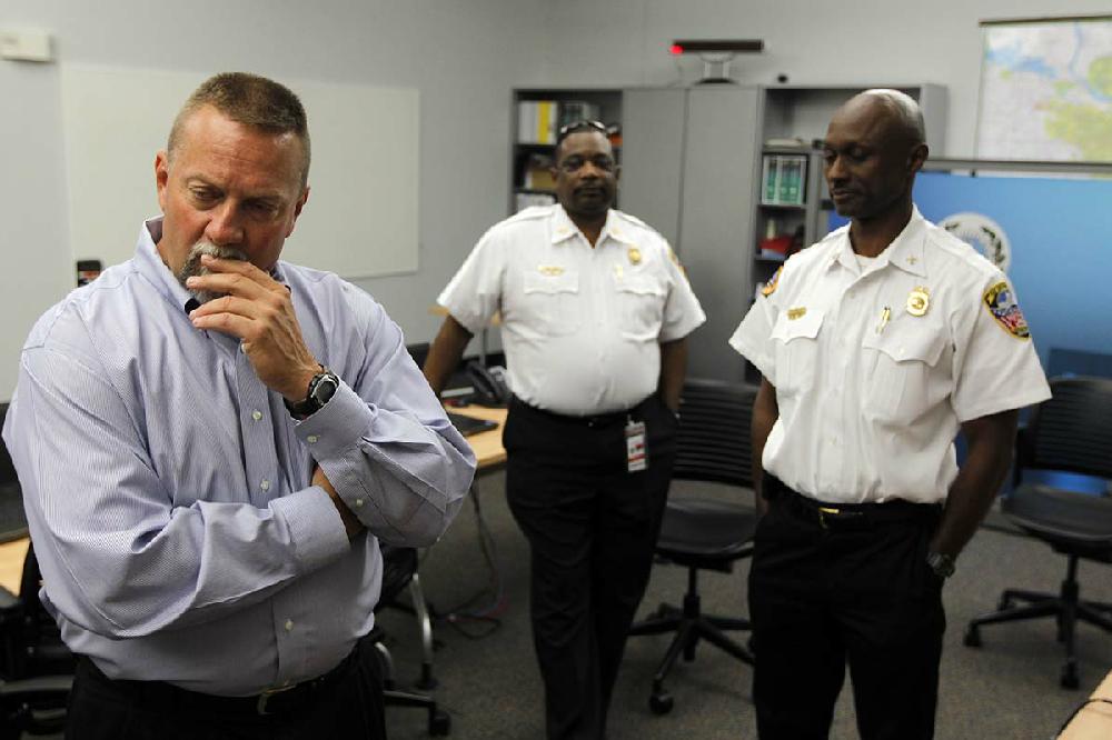 Arkansas Democrat-Gazette/BENJAMIN KRAIN --05/8/2013--
ATF agent Wade Rasberry CQ, left, and Little Rock fire chiefs Greg Summers, center, and Joe Gray conclude an investigation into the cause of a fire at First Baptist Church Highland Park. They were unable to determine any cause.