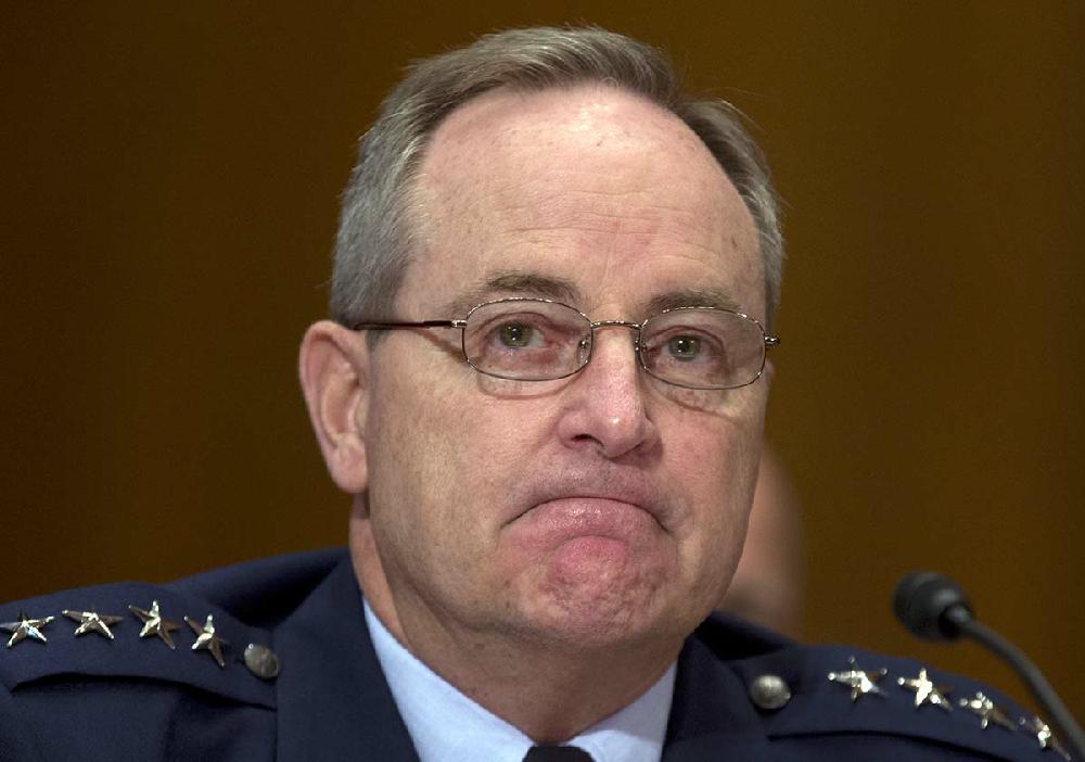 Gen. Mark A. Welsh III, Chief of Staff, Air Force, pauses as he testifies during the Senate Appropriations Defense Subcommittee hearing, Wednesday, May 8, 2013, on Capitol Hill in Washington. The Air Force stripped an unprecedented 17 officers of their authority to control and, if necessary, launch nuclear missiles after a string of unpublicized failings, including a remarkably dim review of their unit's launch skills. (AP Photo/Carolyn Kaster)