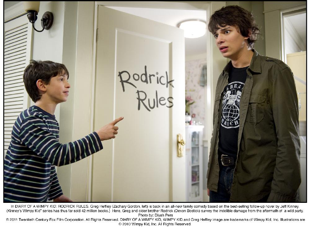 In DIARY OF A WIMPY KID: RODRICK RULES, Greg Heffley (Zachary Gordon, left) is back in an all-new family comedy based on the best-selling follow-up novel by Jeff Kinney. (Kinney's Wimpy Kid series has thus far sold 42 million books.)  Here, Greg and older brother Rodrick (Devon Bostick) survey the indelible damage from the aftermath of  a wild party.