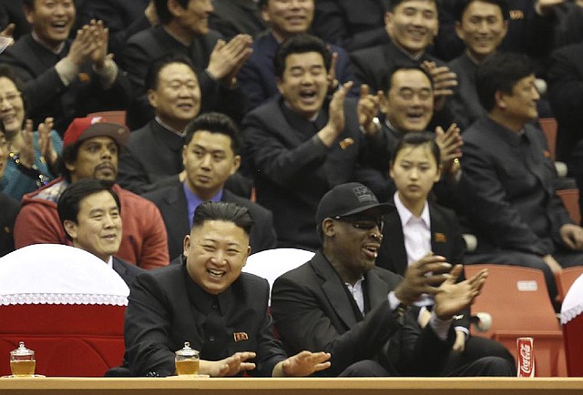 Dennis Rodman (right) is asking North Korean leader Kim Jong Un (left) to release Kenneth Bae after Bae was arrested in November for unspecified “hostile acts” against the state after he entered the country with a disguised identity. 