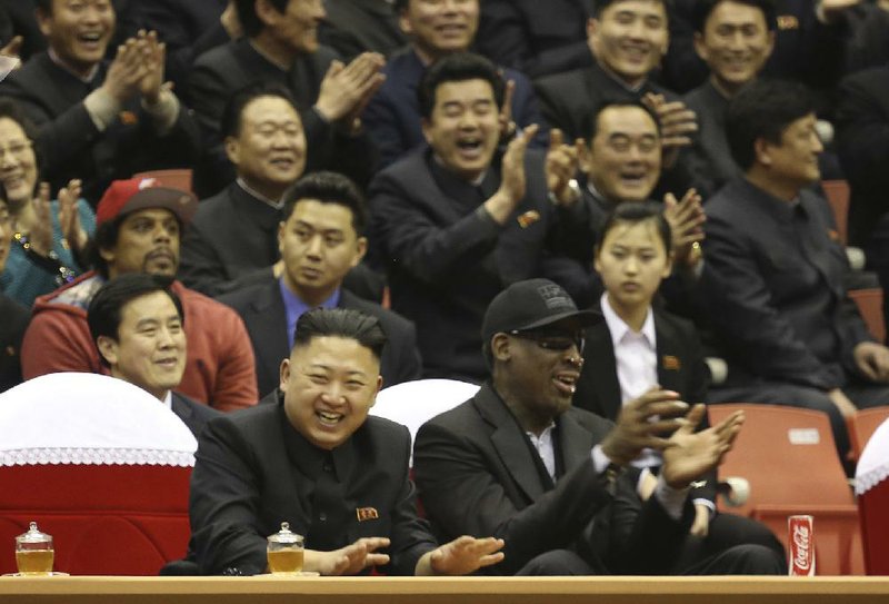 Dennis Rodman (right) is asking North Korean leader Kim Jong Un (left) to release Kenneth Bae after Bae was arrested in November for unspecified “hostile acts” against the state after he entered the country with a disguised identity. 