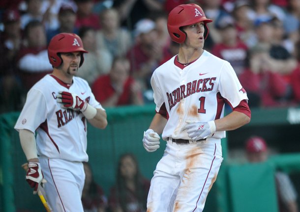 Arkansas left fielder Brian Anderson scores a run in the third inning Saturday at Baum Stadium in Fayetteville. Anderson was 4-for-4 in the Razorbacks' 11-1 win over Tennessee.