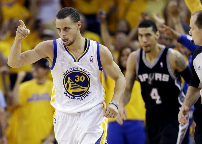 Golden State guard Stephen Curry (left) has the Warriors pointed in the right direction against the San Antonio Spurs after Game 4 in their Western Conference semifinal series Sunday in Oakland, Calif. Curry scored 22 points and the Warriors tied the best-of-seven series at 2-2 with a 97-87 victory in overtime. 