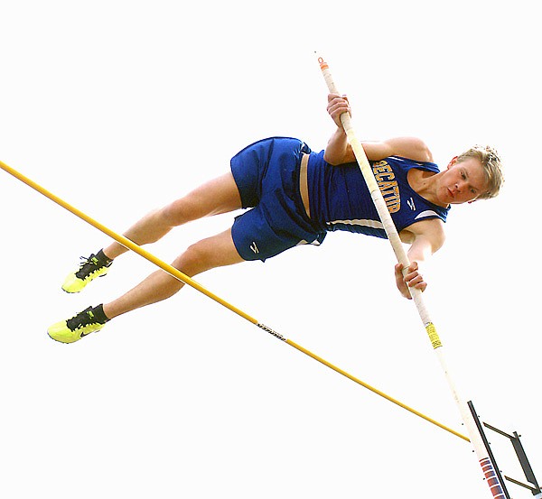 Decatur senior Evan Owens clears the bar in pole vault competition in Gravette earlier this season. Owens won the state championship at Ft. Smith on May 1 with a vault of 13 feet, 4 inches. 