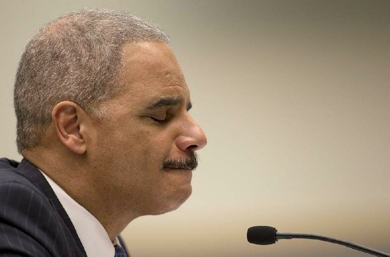 Attorney General Eric Holder pauses Wednesday during testimony before the House Judiciary Committee. 