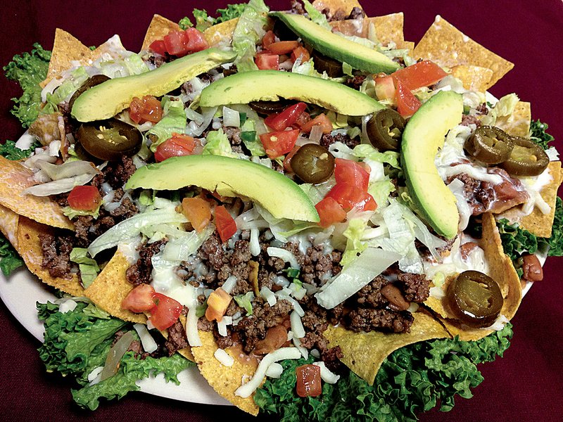 Nachos are loaded and come in two sizes with choice of meat (large beef pictured here) at Lupita’s, 7710 Cantrell Road, Little Rock. 