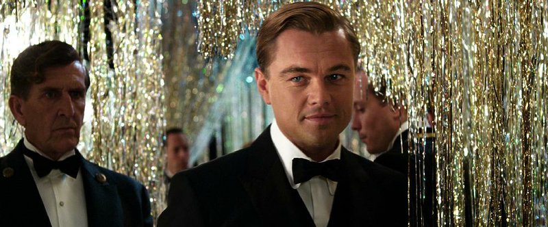 Leonardo DiCaprio (center) stars as Jay Gatsby in the Warner Bros.’ drama The Great Gatsby. It came in second at last weekend’s box office and made more than $50 million. 