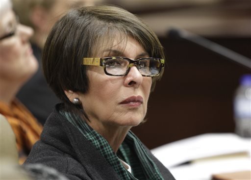 In this Dec. 14, 2012, file photo Arkansas State Treasurer Martha Shoffner at the Arkansas state Capitol in Little Rock. Shoffner plead not guilty to 10 counts of mail fraud in federal court on Thursday morning at her arraignment. A separate trail is scheduled for Monday to try Shoffner on 14 other counts, including bribery, extortion and attempted extortion. 