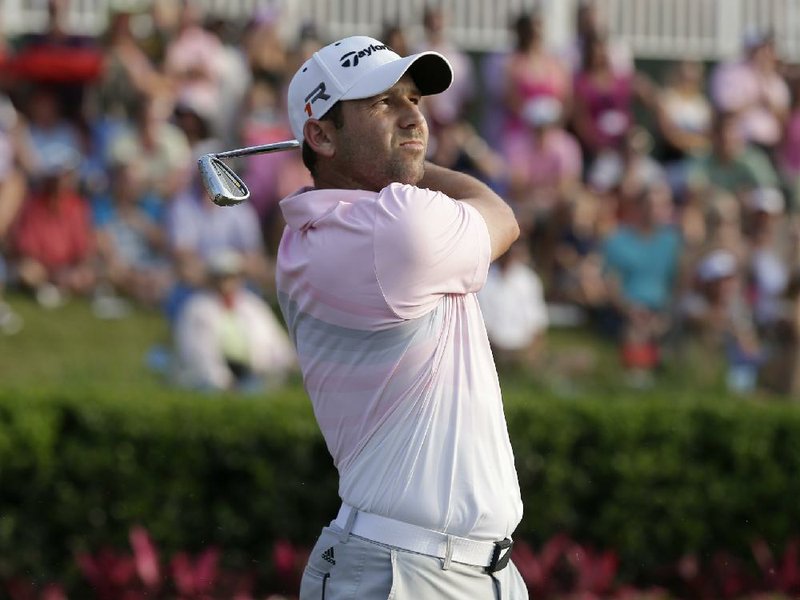 The spat between Sergio Garcia (above) and Tiger Woods began when the two were paired in the third round of The Players Championship.